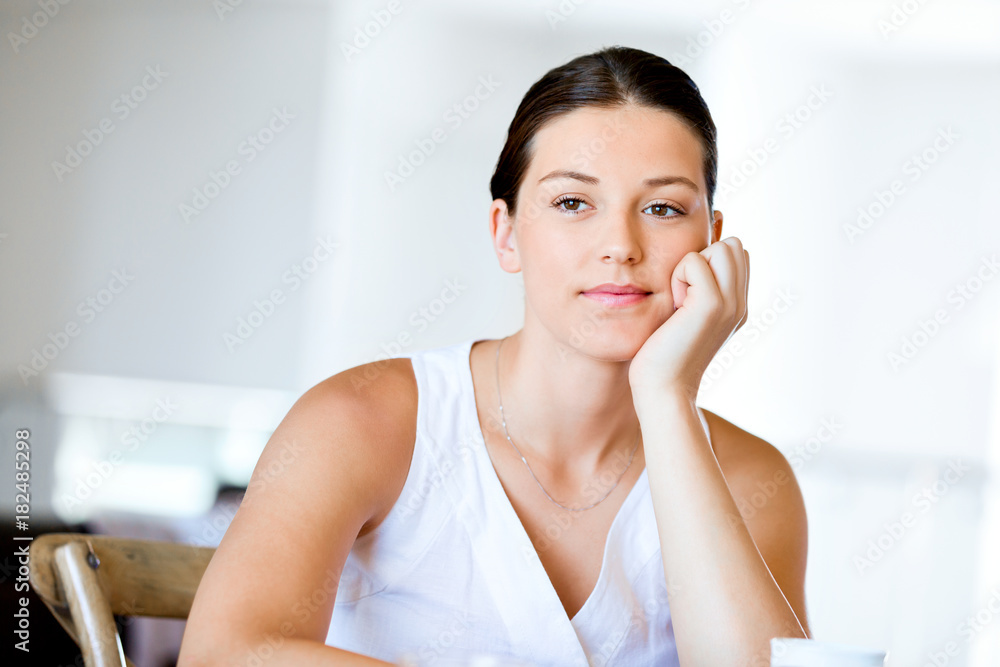 Happy young woman with cup of tea or coffee at home Happy young woman with cup of tea or coffee at home