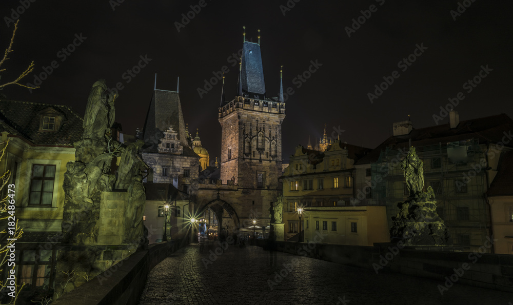 Fototapeta premium Tower on Charles bridge in night Prague