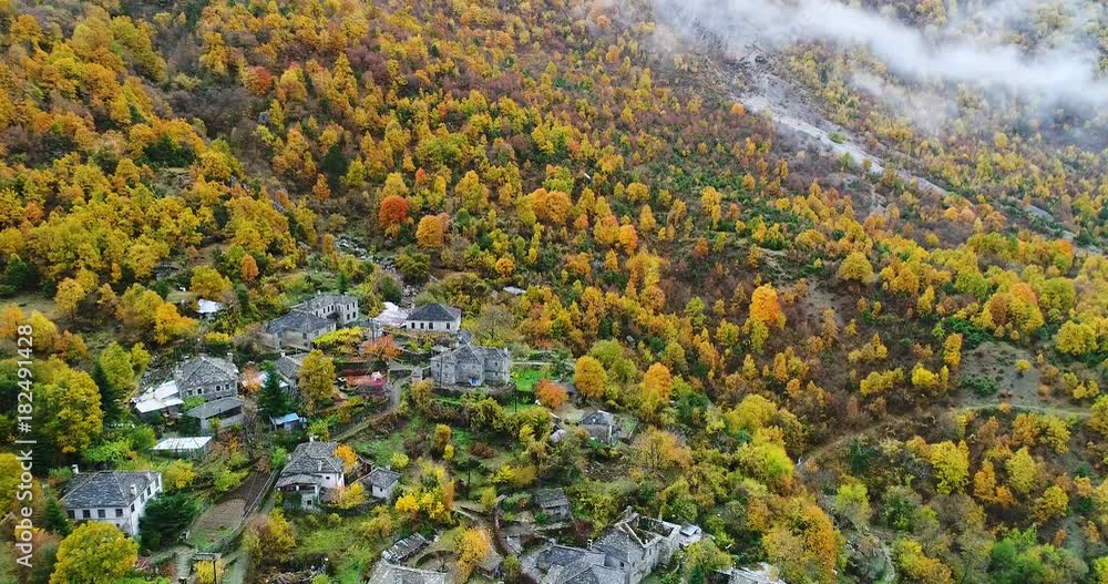 Aerial flight with drone over the old stone houses in the village Papingo, Greece Aerial flight with drone over the old stone houses in the village Papingo, Greece