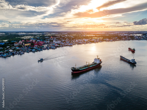 Samutsakorn at thailand, waterfont with boat on sea,twighlight time ,Aerial drone view,top view boat