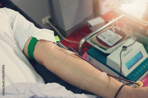 Konstfotografi Nurse receiving blood from blood donor in hospital.