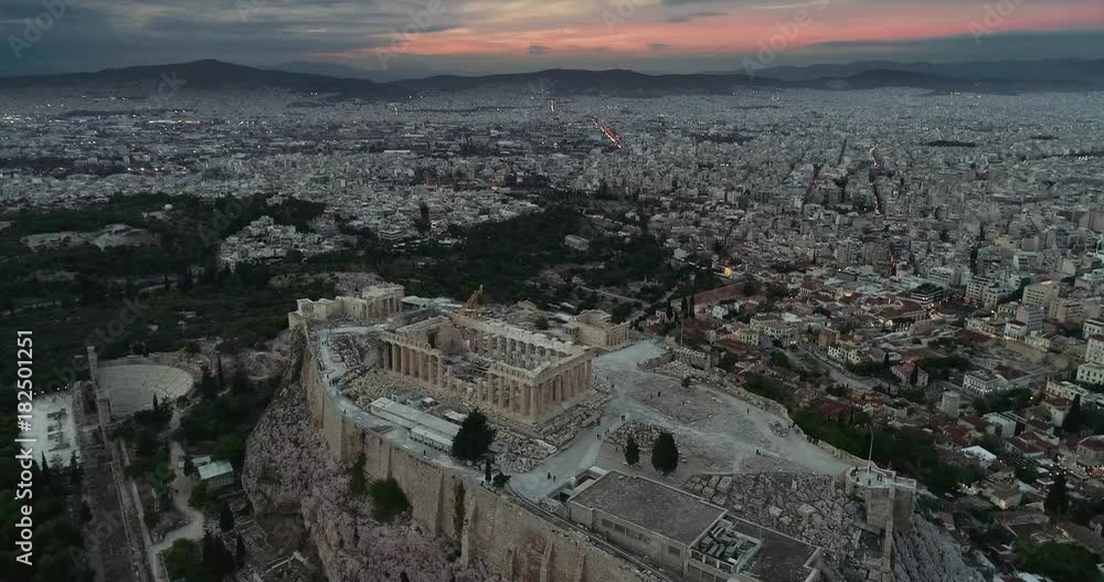 Aerial flight with drone over the famous of Parthenon and Acropolis in Athens,Greece Aerial flight with drone over the famous of Parthenon and Acropolis in Athens,Greece