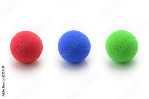 Red, Blue, Gree Small Sponge Balls on White Background