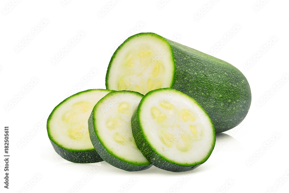 fresh green zucchini with slice isolated on white background fresh green zucchini with slice isolated on white background