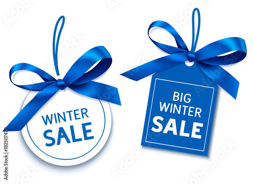 Winter sale tag with blue bow for your design. Vector set of discount labels