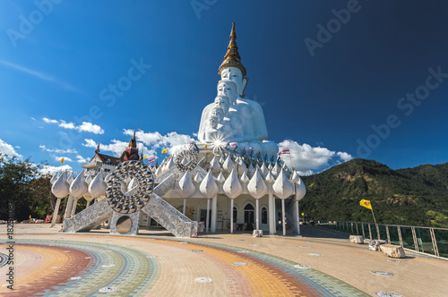 White Big Buddha images with different sizes. at Wat Phasornkaew or Wat Phra Thart Pha Kaew is a buddhist monastery and temple in Khao Kor, Phetchabun. photo