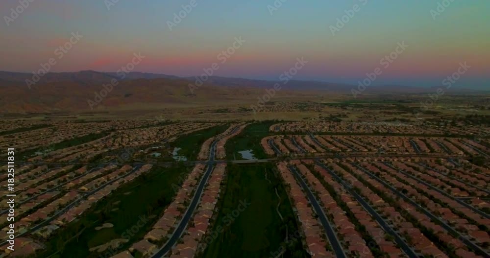 Descending aerial shot over Palm Desert in Palm Springs at dusk Descending aerial shot over Palm Desert in Palm Springs at dusk