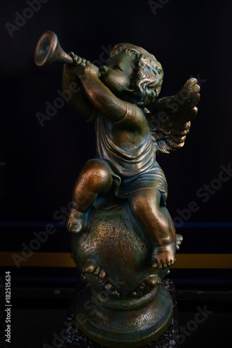 Cupid Sculpture Blowing Trumpet 