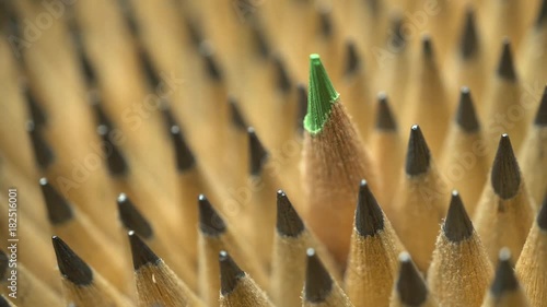 Uniform geometrical group of graphic pencils with green one in focus