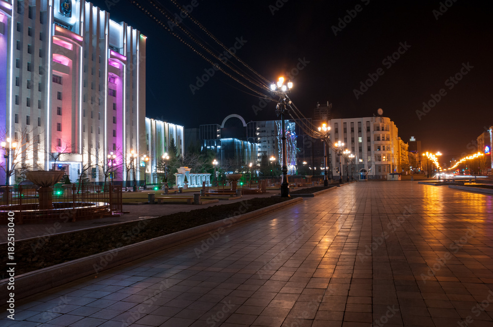 Fototapeta premium Night Khabarovsk: an office building on Lenin Square