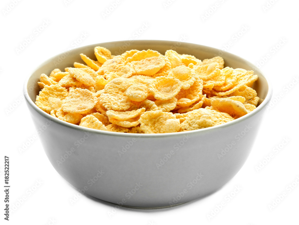 Bowl with tasty corn flakes on white background Bowl with tasty corn flakes on white background