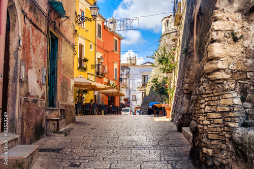 colorful south italy village alley in Apulia in the town of Vico del Gargano photo