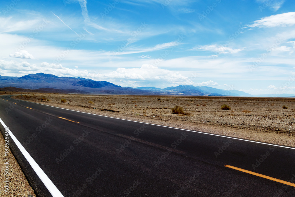 highway in the desert, mountains and beautiful sky highway in the desert, mountains and beautiful sky