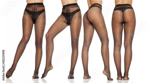collage of pretty, nice groomed woman's legs in black nylon tights on white background photo