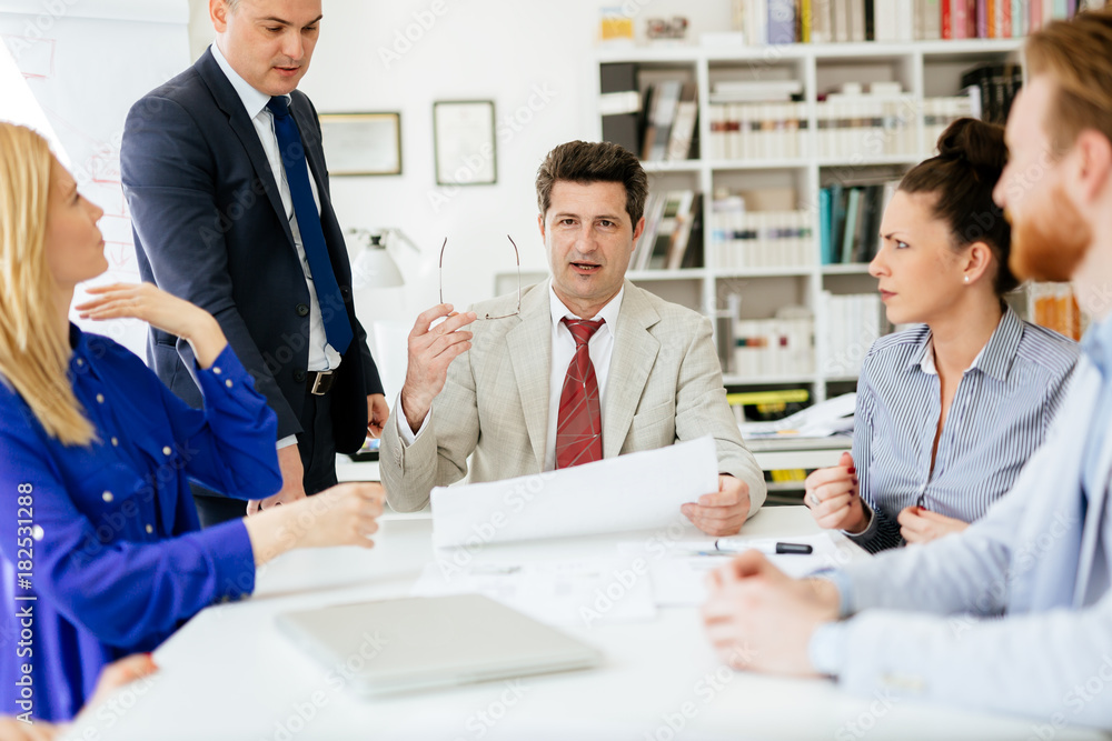 Business people having a board meeting Business people having a board meeting