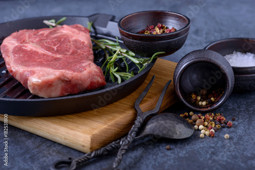 Raw meat beef steak on grill pan