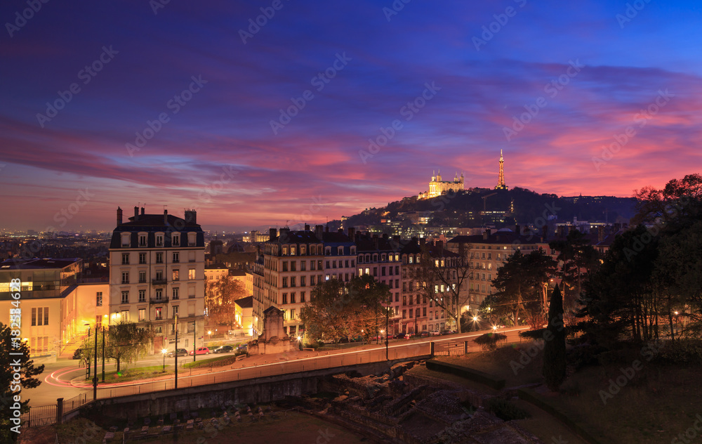 Colorful evening over Vieux Lyon and Basilica Notre-Dame de Fourviere. Lyon, France.