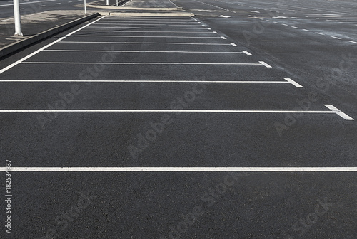 Empty parking lot outdoor with white marking lines © onlooka