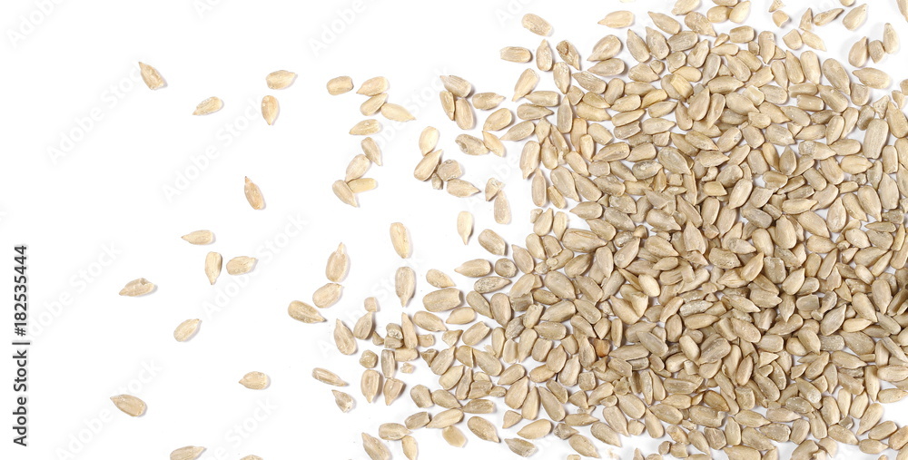 Peeled sunflower seeds isolated on white background, top view Peeled sunflower seeds isolated on white background, top view
