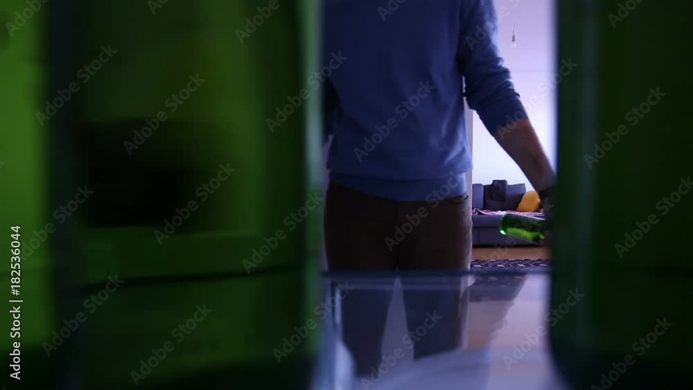 Man taking beer from the fridge Man taking beer from the fridge