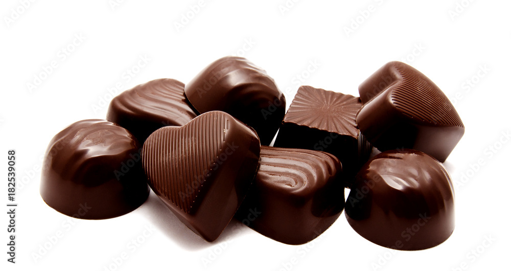 Assortment of chocolate candies sweets isolated on a white Assortment of chocolate candies sweets isolated on a white