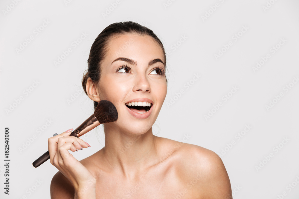 Beauty portrait of a cheerful beautiful half naked woman Beauty portrait of a cheerful beautiful half naked woman