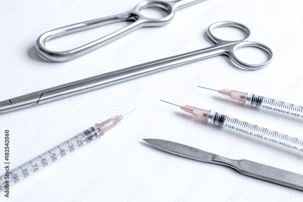 instruments for plastic surgery on white background instruments for plastic surgery on white background