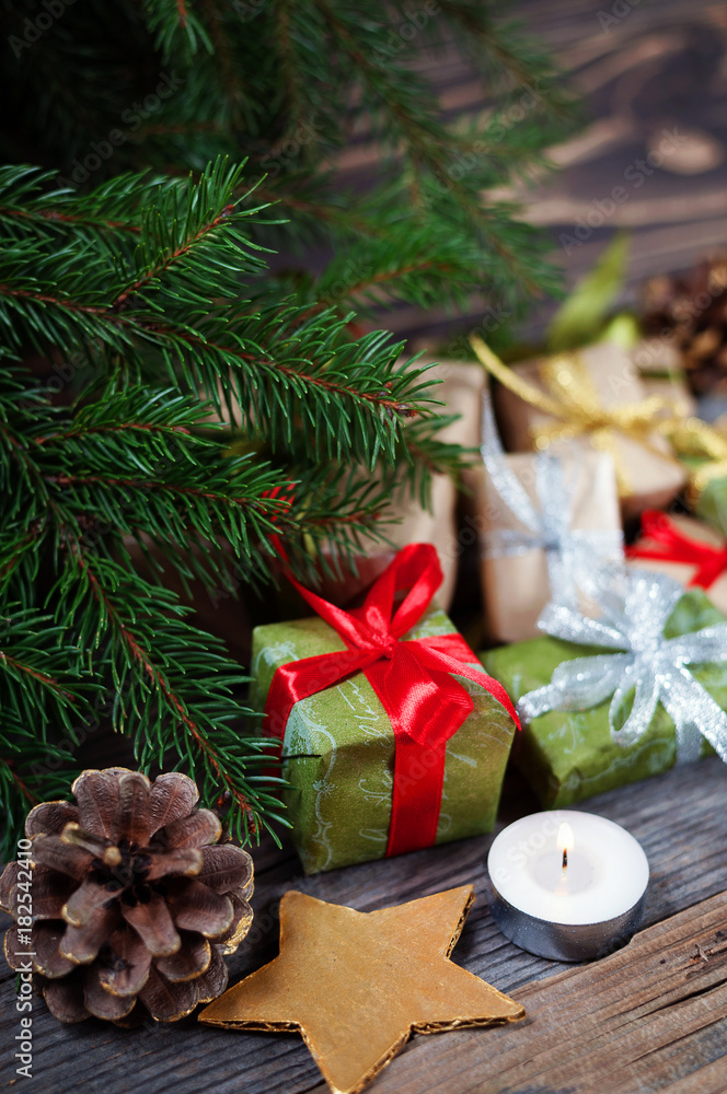 Some nice presents in a new year wrapping paper on wooden table, beautiful christmas tree on the background. Some nice presents in a new year wrapping paper on wooden table, beautiful christmas tree on the background.