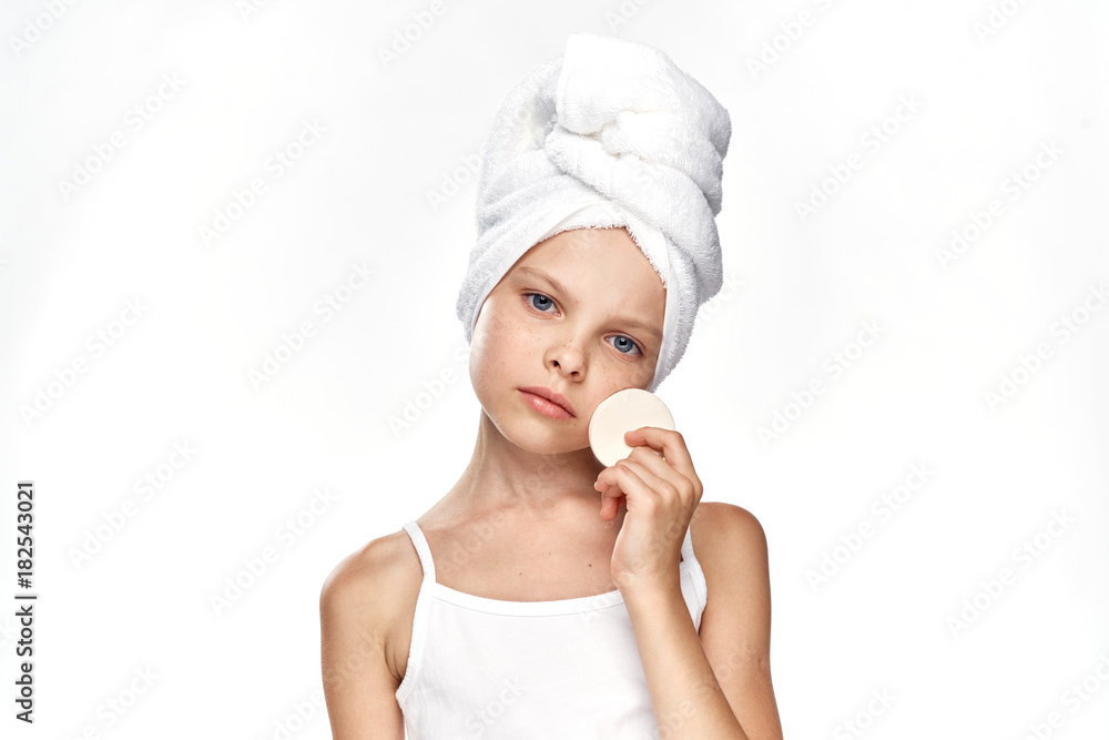 little girl with a sponge for washing little girl with a sponge for washing