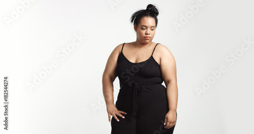 Plus size model in studio shoot happy smiling photo