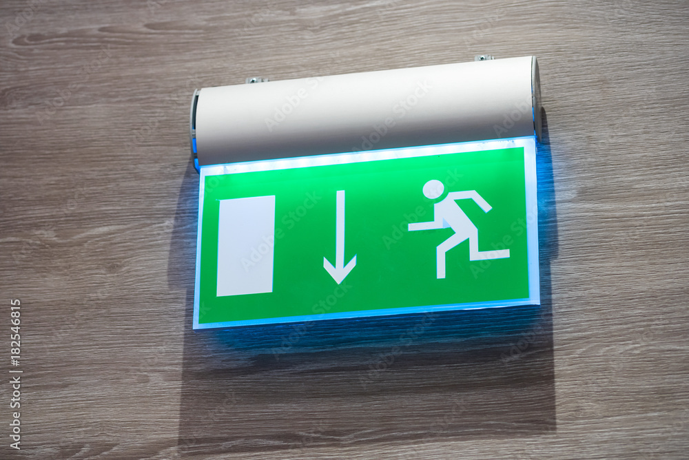 pointer to exit on the wall pointer to exit on the wall