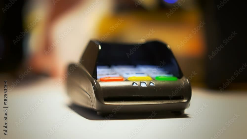 Man paying with NFC technology on smartphone. Man paying with NFC technology on smartphone.