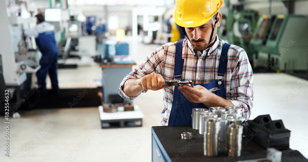 modern industrial machine operator working in factory modern industrial machine operator working in factory