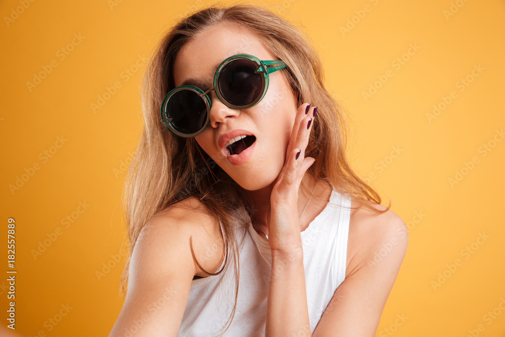 Portrait of a young girl in sunglasses taking a selfie Portrait of a young girl in sunglasses taking a selfie