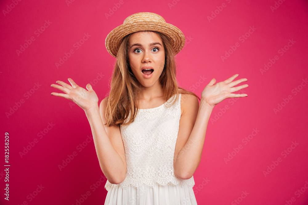Portrait of an excited pretty girl dressed in summer dress Portrait of an excited pretty girl dressed in summer dress