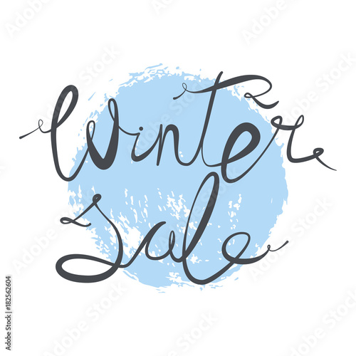 Winter sale. Dry brush textures circle, blue color, with hand drawn text, for promotion. Vector illustration, isolated on white background.