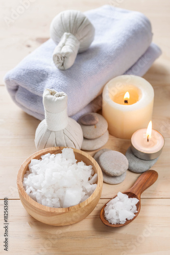 Salt spa and massage objects over wooden background, wellness and relaxation concept