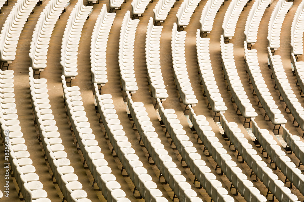 Pattern of white stadium seats Pattern of white stadium seats