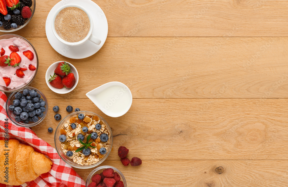 Rich breakfast on natural wooden table Rich breakfast on natural wooden table
