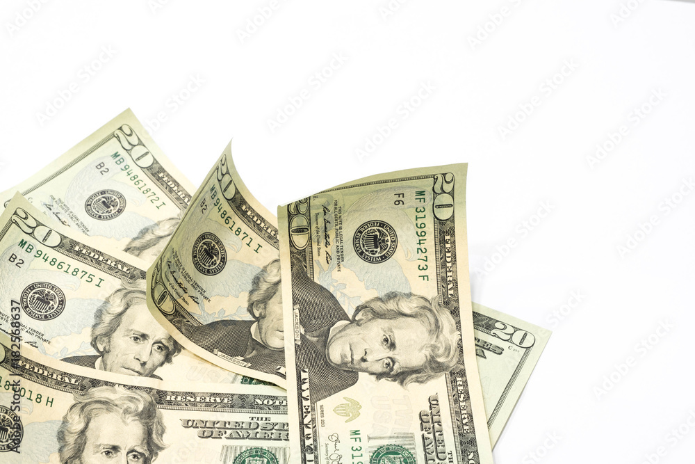 Stack of twenty dollar bills on white background. Stack of twenty dollar bills on white background.