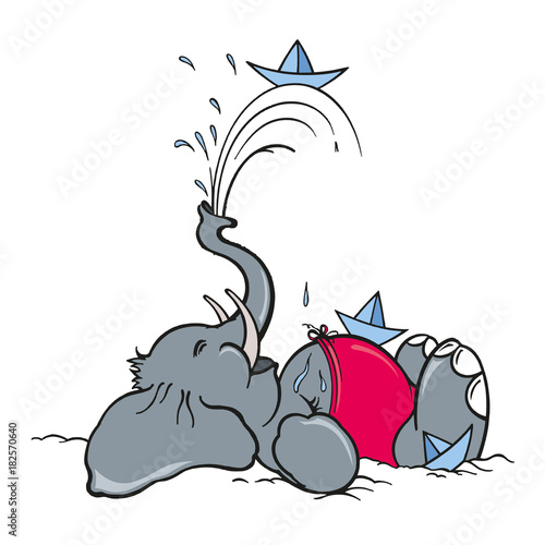 Young elephant lying on the ground