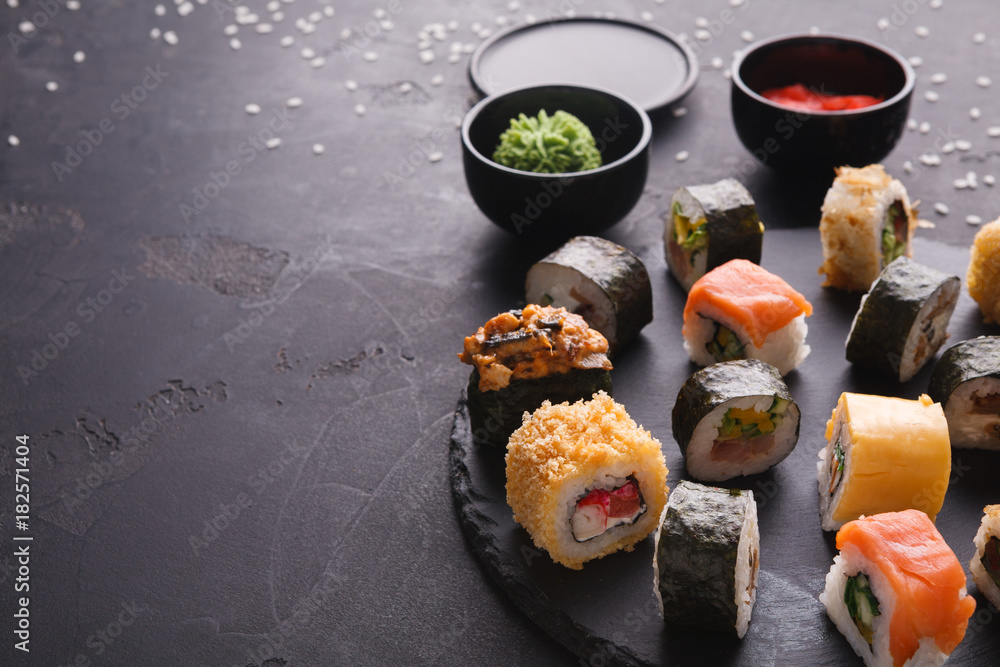 Sushi and rolls background, japanese cuisine Sushi and rolls background, japanese cuisine