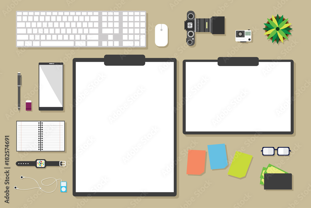 Top view of table working and working desk with gadget and free space for text with accessory on the table, note, phone, keyboard, camera, pen, flowerpot, watch Top view of table working and working desk with gadget and free space for text with accessory on the table, note, phone, keyboard, camera, pen, flowerpot, watch