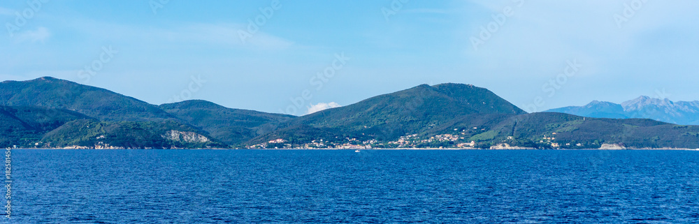 Mountains covered by bush and trees on Island of Elba