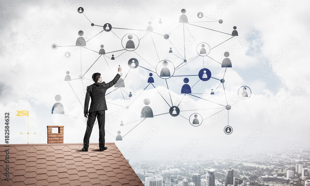 Businessman on house roof presenting networking and connection c Businessman on house roof presenting networking and connection c
