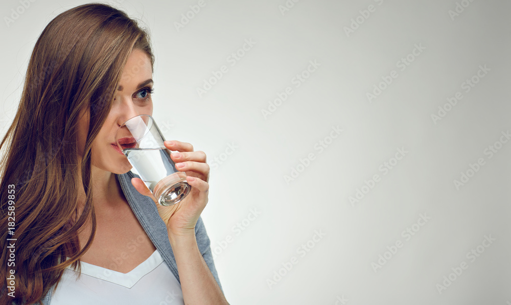 Isolated studio portrait of girl with water glass. Isolated studio portrait of girl with water glass.