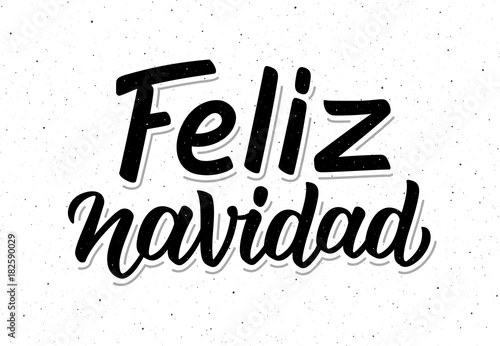 Feliz Navidad spanish Merry Christmas text on white background with craft paper texture. Retro letterpress poster with calligraphy lettering for season greetings. Vector background