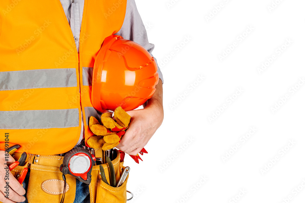 torso engineer or worker hand holding orange helmet for workers. torso engineer or worker hand holding orange helmet for workers.