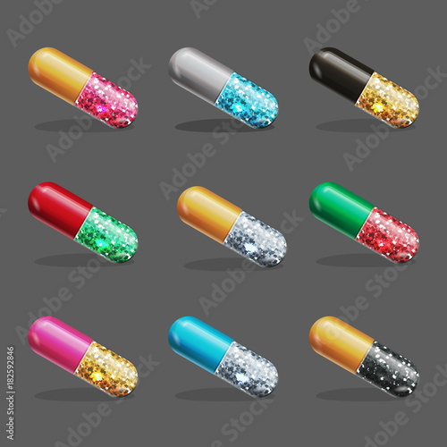 Pill capsule filled with glitter sparkling dust