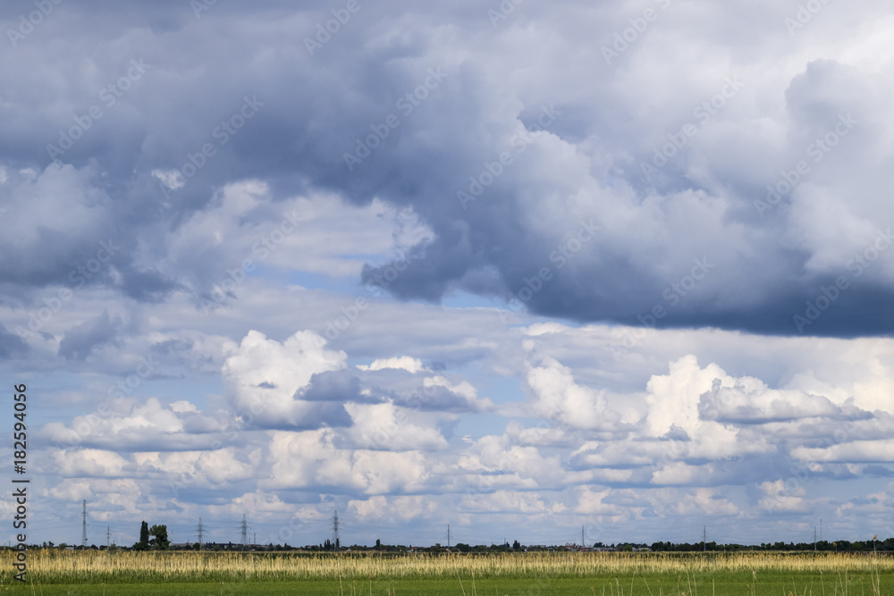 Heavenly landscape with clouds. Cumulus clouds in the sky Heavenly landscape with clouds. Cumulus clouds in the sky